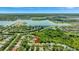 Aerial view showcasing the home's location near a lake at 10906 Holly Cone Dr, Riverview, FL 33569