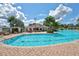 Relaxing pool area with a swim-up bar and patio seating at 10906 Holly Cone Dr, Riverview, FL 33569