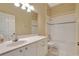 Clean bathroom with a shower/tub combo and vanity at 10906 Holly Cone Dr, Riverview, FL 33569