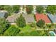 Aerial view of the home's backyard and neighborhood at 10906 Holly Cone Dr, Riverview, FL 33569