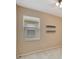 Simple bedroom with window, blinds and floating shelves at 10906 Holly Cone Dr, Riverview, FL 33569