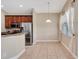 Bright dining area with tile floor and window with curtains at 10906 Holly Cone Dr, Riverview, FL 33569
