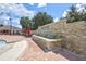 Community entrance with a stone waterfall feature at 10906 Holly Cone Dr, Riverview, FL 33569