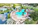 Resort-style pool with multiple areas, including a spa and shaded seating at 10906 Holly Cone Dr, Riverview, FL 33569