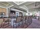Indoor pool bar with seating and kitchen area at 10906 Holly Cone Dr, Riverview, FL 33569