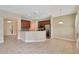Kitchen features granite countertops and wood cabinets at 10906 Holly Cone Dr, Riverview, FL 33569