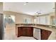 Large kitchen island with granite countertops and stainless steel appliances at 10906 Holly Cone Dr, Riverview, FL 33569