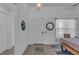 Bright and airy entryway with tile flooring and access to other rooms at 13333 Gershwin Ln, Port Charlotte, FL 33981