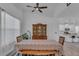 Dining room with a large table, hutch, and view into the kitchen at 13333 Gershwin Ln, Port Charlotte, FL 33981