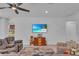 Relaxing living room with ample natural light and comfortable seating at 13333 Gershwin Ln, Port Charlotte, FL 33981