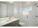 Bathroom with shower, toilet and single vanity at 10324 Longmeadow Ave, Parrish, FL 34219