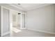 Bedroom with French doors and neutral decor at 10324 Longmeadow Ave, Parrish, FL 34219