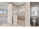 Spa-like bathroom with large walk-in shower and separate toilet area at 10426 Longmeadow Ave, Parrish, FL 34219