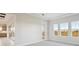 Spacious bedroom with multiple windows offering abundant natural light at 10426 Longmeadow Ave, Parrish, FL 34219