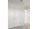 Bright bedroom with double door closet and neutral wall colors at 10426 Longmeadow Ave, Parrish, FL 34219