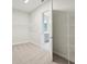 Spacious walk-in closet with built-in shelving and hanging rods at 10426 Longmeadow Ave, Parrish, FL 34219