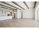 Modern kitchen with white cabinets, quartz countertops, and stainless steel appliances at 10422 Longmeadow Ave, Parrish, FL 34219