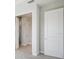 Bedroom with access to bathroom and additional closet space at 10422 Longmeadow Ave, Parrish, FL 34219