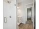 Bathroom with a walk-in shower, toilet and modern vanity at 10422 Longmeadow Ave, Parrish, FL 34219