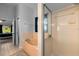 Bathroom features a tub and a separate shower stall with glass doors at 2618 Crestfield Dr, Valrico, FL 33596