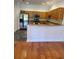 Modern kitchen with stainless steel appliances and granite counters at 277 Valencia Cir, St Petersburg, FL 33716