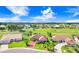 Aerial view of a beautiful house in a golf course community at 1826 Wolf Laurel Dr, Sun City Center, FL 33573