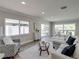 Spacious living room filled with natural light featuring stylish furniture and neutral decor at 120 Chesapeake Ave, Tampa, FL 33606