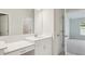 Bathroom with single vanity and access to bedroom and closet at 12398 Oak Hill Way, Parrish, FL 34219