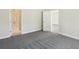 Spacious bedroom with carpeting and access to bathroom at 12378 Oak Hill Way, Parrish, FL 34219
