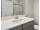 Clean bathroom with gray vanity and white countertop at 12378 Oak Hill Way, Parrish, FL 34219