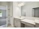 Modern bathroom with vanity, sink, and large mirror at 12378 Oak Hill Way, Parrish, FL 34219