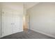 Bedroom with double doors and neutral walls and carpet at 12378 Oak Hill Way, Parrish, FL 34219