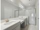 Modern bathroom with double vanity and glass shower at 12378 Oak Hill Way, Parrish, FL 34219