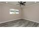 Spacious bedroom with wood-look floors and large window at 120 Chesapeake Ave, Tampa, FL 33606