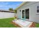 Relaxing backyard patio with seating area, perfect for outdoor enjoyment at 120 Chesapeake Ave, Tampa, FL 33606