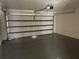 Attached garage with an automatic garage door at 7047 Everest St, Spring Hill, FL 34606