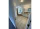 Elegant bathroom with dual sinks, a garden tub, and a walk-in shower at 849 Laurelridge Ct, Brooksville, FL 34601