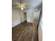 Cozy bedroom showcasing new floors, a ceiling fan, and fresh paint at 849 Laurelridge Ct, Brooksville, FL 34601