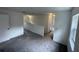 Upstairs hallway featuring fresh paint, new floors, and ample natural light at 849 Laurelridge Ct, Brooksville, FL 34601