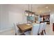 Spacious dining area with a large table, great for entertaining at 11411 Drifting Leaf Dr, Riverview, FL 33579