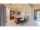 Modern kitchen with large island, stainless steel appliances, and ample cabinetry at 11411 Drifting Leaf Dr, Riverview, FL 33579