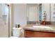Clean bathroom with granite countertop and walk-in shower at 11411 Drifting Leaf Dr, Riverview, FL 33579