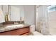 Clean bathroom with granite countertop and shower at 11411 Drifting Leaf Dr, Riverview, FL 33579