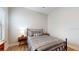 Cozy bedroom with wood floors and a ceiling fan at 11411 Drifting Leaf Dr, Riverview, FL 33579