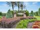 A beautifully landscaped entrance to the Lake Shore Ranch community at 19300 Lonesome Pine Dr, Land O Lakes, FL 34638