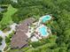 Overhead aerial view of the community clubhouse, recreation areas, and luxurious swimming pools at 19300 Lonesome Pine Dr, Land O Lakes, FL 34638