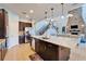 Open-concept kitchen with a large island and stainless steel appliances at 19300 Lonesome Pine Dr, Land O Lakes, FL 34638