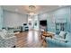 A charming living room with colorful decor, ample seating, and plenty of natural light at 19300 Lonesome Pine Dr, Land O Lakes, FL 34638