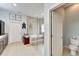 A modern bathroom with a tiled shower, a soaking tub, and elegant fixtures at 19300 Lonesome Pine Dr, Land O Lakes, FL 34638