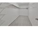 Large walk-in closet with wire shelving at 16903 Peaceful Valley Dr, Wimauma, FL 33598